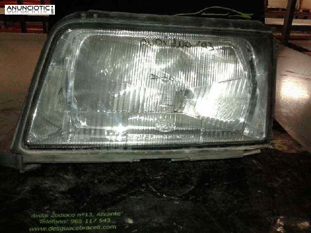 Faro izquierdo de audi 100 (121396)