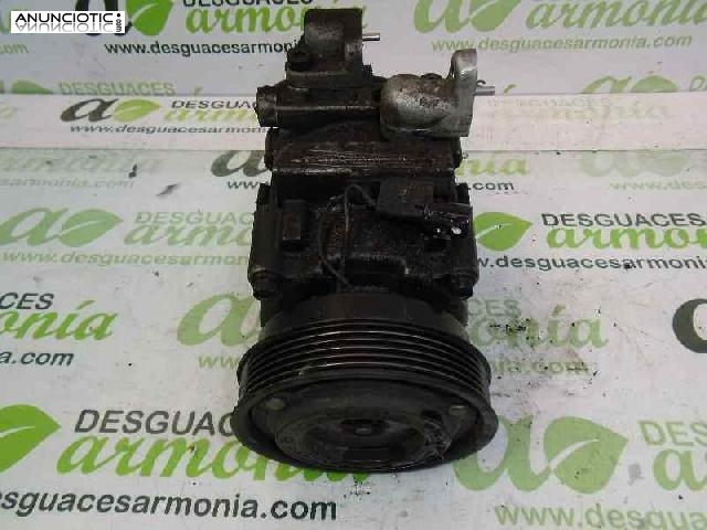 Compresor a/a tipo 977012e500 de kia -