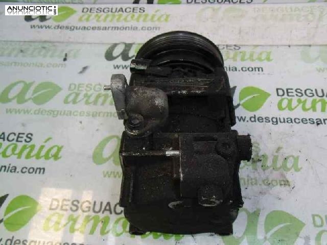 Compresor a/a tipo 977012e500 de kia -