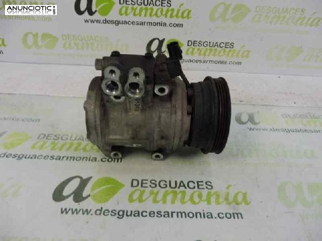 Compresor a/a tipo 977012f100 de kia -