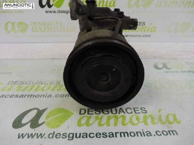 Compresor a/a tipo 977012f100 de kia -