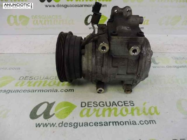 Compresor a/a tipo 977012f100 de kia -