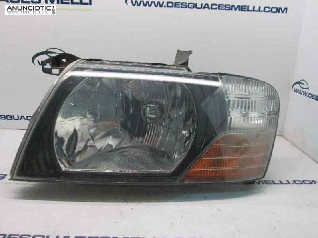 Faros 277162 de mitsubishi montero 2002