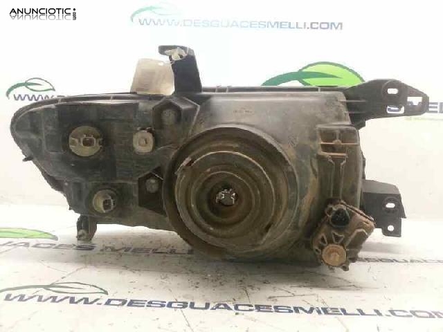 Faros 1064854 de mitsubishi montero 2004