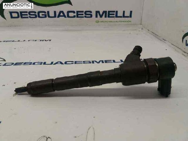 Inyector 1976915 de opel r-0445110083