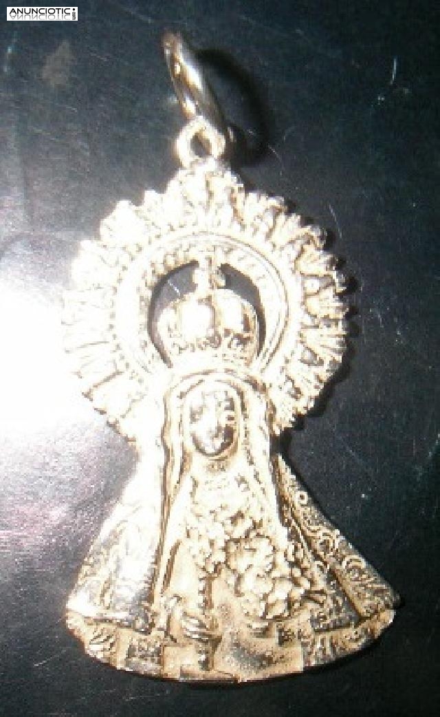 MEDALLA VIRGEN DE LA ANTIGUA EN ORO Y EN PLATA.