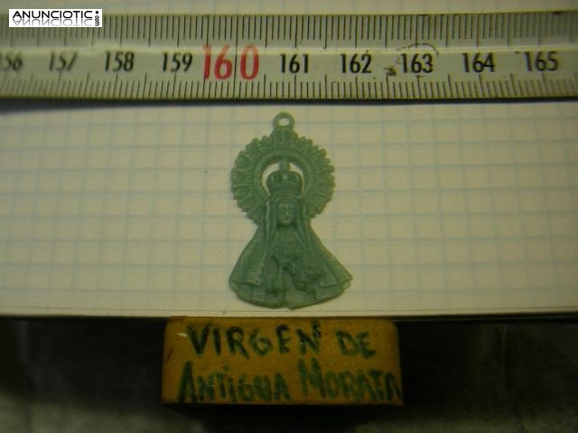 MEDALLA VIRGEN DE LA ANTIGUA EN ORO Y EN PLATA.