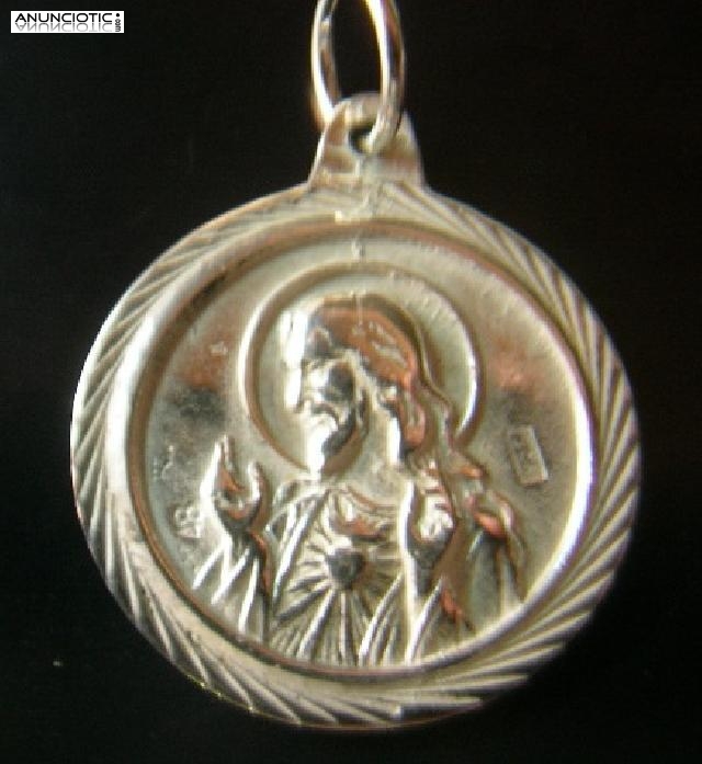 Medallas virgen del camino Leon oro y plata