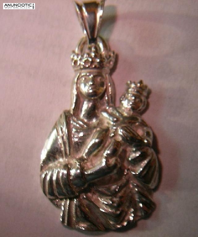 MEDALLA VIRGEN DE LA ALMUDENA EN ORO Y EN PLATA.